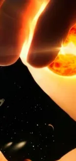 Hand holding fiery planet in space wallpaper.