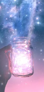 Hand holding a glowing jar under a starry night sky.