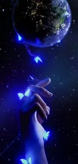 Hand reaching to glowing blue butterflies in cosmic space with Earth view.