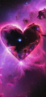 Heart-shaped nebula with purple and pink hues in space.