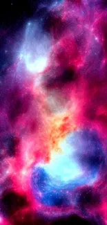 Vibrant nebula with cosmic colors in pink and blue tones for mobile wallpaper.