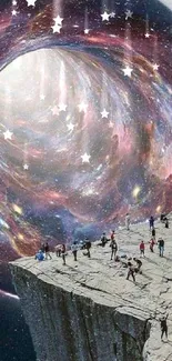 People stand on a cliff near a swirling cosmic portal.