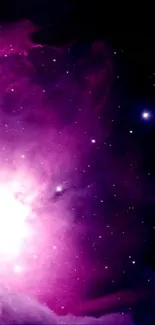 Purple galaxy wallpaper with stars and cosmic clouds.