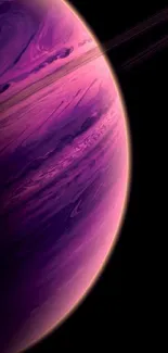 Purple planet with rings on cosmic mobile wallpaper.