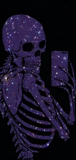 Cosmic-themed skeleton holding smartphone against black background.