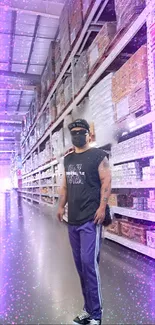 Man in cosmic-themed warehouse with purple sparkles.