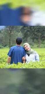 Happy couple enjoying a green field landscape.