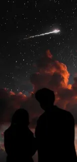 Silhouetted couple under starry sky with orange clouds.