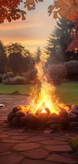 Autumn fire pit with glowing flames under a colorful sunset sky.