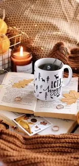 Cozy autumn morning scene with coffee, books, and candles.