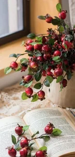 Cozy corner with red berries and book by window.