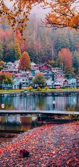 Autumn village by a serene lake with vibrant fall colors.