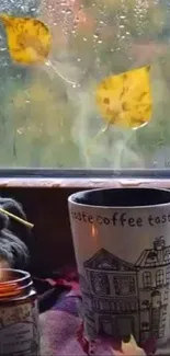 Cozy autumn scene with mug, candle, and falling leaves by a window.