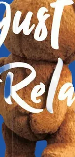 Teddy bear with 'Just Relax' text on blue background.