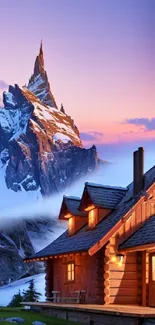 A cozy cabin at twilight with a towering mountain.