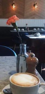 Marble table with coffee cup in cozy café ambience.