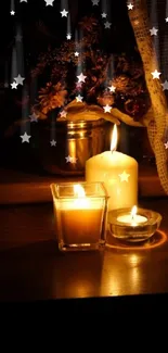 Three candles casting a warm glow on a cozy evening scene.