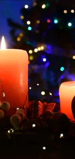 Red candles with festive lights against a dark background.