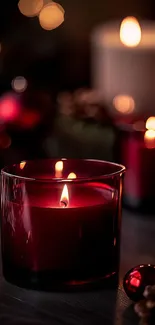 Red candles softly glowing in cozy ambiance.