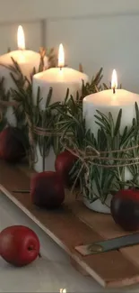 Cozy rustic wallpaper with candles and apples.