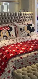 Cozy bedroom with cartoon-themed bedding in red.