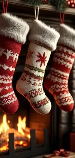 Three festive Christmas stockings hanging by a cozy fireplace.