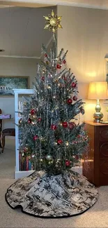 Cozy room with a decorated Christmas tree.