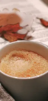 Cozy autumn scene with coffee and book.