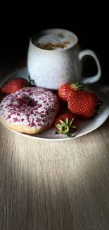 Coffee cup with donut and strawberries on table.