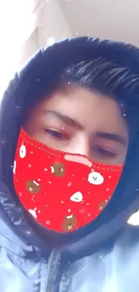 Person in a hoodie with a red mask, featuring cozy and stylish elements.