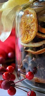 Mobile wallpaper of a cozy jar with citrus and red berries.