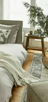 Cozy minimalist bedroom with earthy decor and neutral tones.