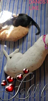 A dog and two cats relaxing on a striped blue mat with 'Love' text.