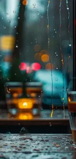 Rainy window with blurred city lights and reflections.