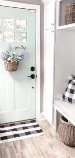 Cozy entryway with mint door and rustic decor.