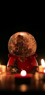 Cozy snow globe with candlelight glow, perfect for winter vibes.