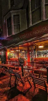 Cozy street cafe at night with warm, inviting lights and outdoor seating.