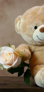 Teddy bear with rose and white curtain in cozy setting.