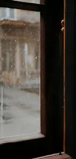 Cozy view through a rainy window with urban street scene.