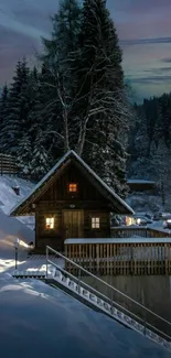 Cozy cabin at night in snowy forest landscape.