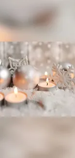 Cozy winter-themed mobile wallpaper with candles and snowflakes.