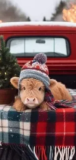 Cozy cow wearing a hat on a plaid blanket in a festive winter scene.