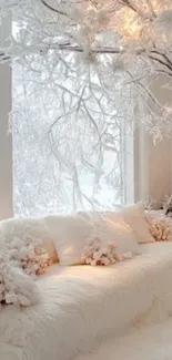 Cozy room with snow-covered tree and white sofa.