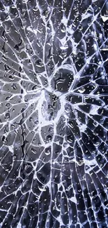 Cracked glass mobile wallpaper with silvery hues and intricate patterns.