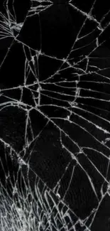 Cracked glass design on a dark wallpaper background.