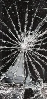 Cracked glass mobile wallpaper with sharp, intricate patterns on a dark background.