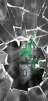 Circuit board visible through shattered glass wallpaper.