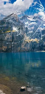 Cracked mountain lake with blue water and rocky peaks under cloudy sky.