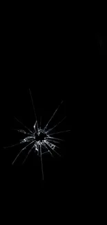 Dark wallpaper with a realistic cracked screen effect.