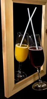 Reflective drinks with a mirror frame on a dark background.